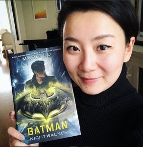 Marie Lu holding Batman